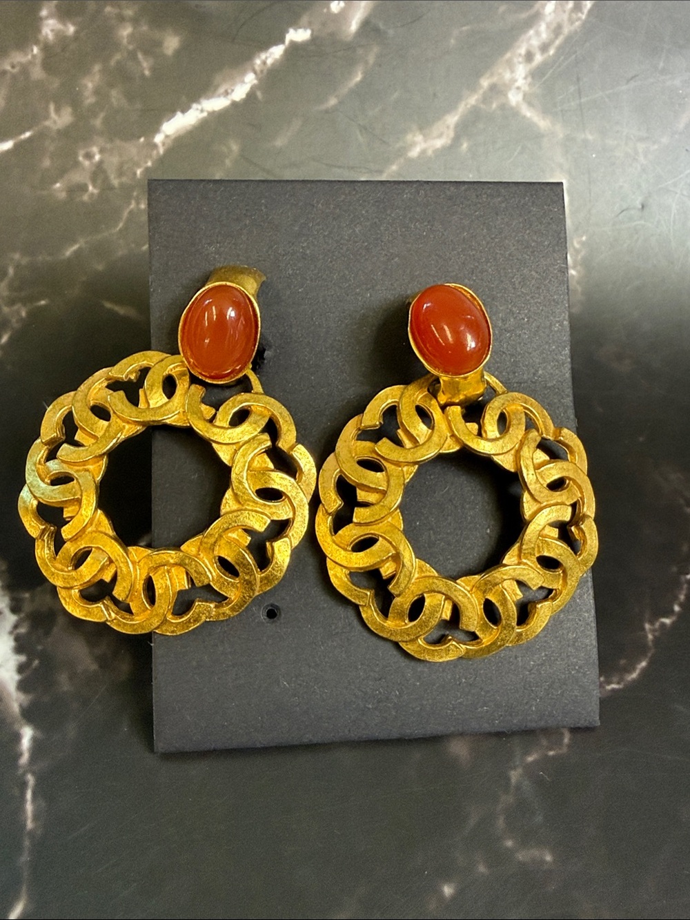 CHANEL Gold-Tone Link Hoop Earrings with Red Cabochon